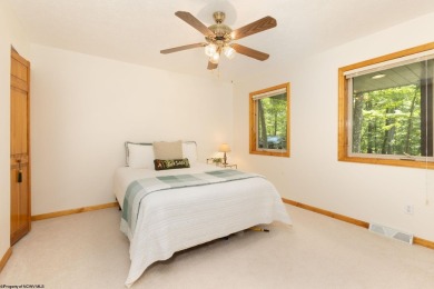 Welcome to 'Nature's Nook', a beautiful cape cod cabin located on Alpine Lake Resort in West Virginia - for sale on GolfHomes.com, golf home, golf lot