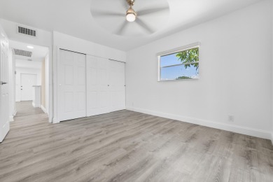 Waterfront Elegance | 2BR/2BA in King's Point Golf & Country on Kings Point Golf -Flanders Way in Florida - for sale on GolfHomes.com, golf home, golf lot