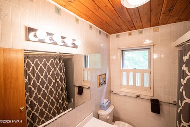 Discover this spacious contemporary home tucked away on a quiet on The Hideout Golf in Pennsylvania - for sale on GolfHomes.com, golf home, golf lot