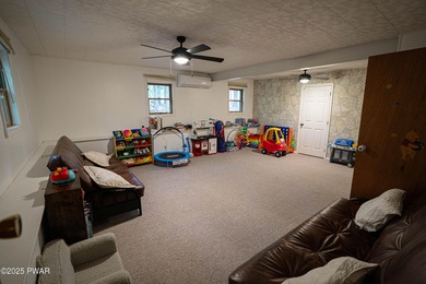 Discover this spacious contemporary home tucked away on a quiet on The Hideout Golf in Pennsylvania - for sale on GolfHomes.com, golf home, golf lot