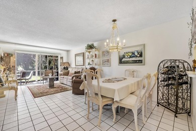 Former model corner unit in a desirable 55+ community w/ on  in Florida - for sale on GolfHomes.com, golf home, golf lot