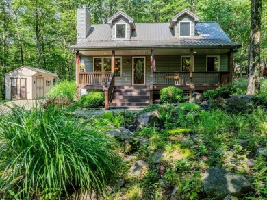 Welcome to 'Nature's Nook', a beautiful cape cod cabin located on Alpine Lake Resort in West Virginia - for sale on GolfHomes.com, golf home, golf lot