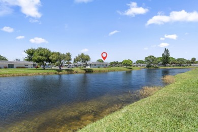 Waterfront Elegance | 2BR/2BA in King's Point Golf & Country on Kings Point Golf -Flanders Way in Florida - for sale on GolfHomes.com, golf home, golf lot