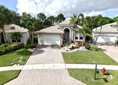 Nestled within the sought-after Aberdeen Golf & Country Club on Aberdeen Golf and Country Club in Florida - for sale on GolfHomes.com, golf home, golf lot