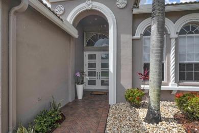 Nestled within the sought-after Aberdeen Golf & Country Club on Aberdeen Golf and Country Club in Florida - for sale on GolfHomes.com, golf home, golf lot