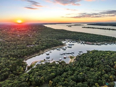 AMAZING LAKE PROPERTY WITH BOAT SLIP! LAKE TEXOMA WATERFRONT on Tanglewood Resort in Texas - for sale on GolfHomes.com, golf home, golf lot