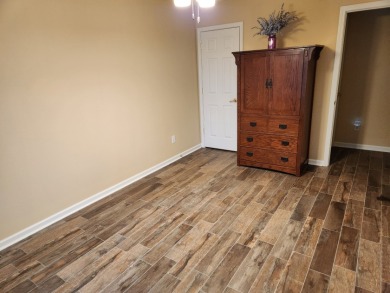 Beautifully remodeled four-bedroom home with a three-car garage on Tellico Village -The Links At Kahite Golf Course in Tennessee - for sale on GolfHomes.com, golf home, golf lot