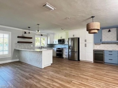 Beautifully upgraded single family home in the highly desired on Country Club of Naples in Florida - for sale on GolfHomes.com, golf home, golf lot