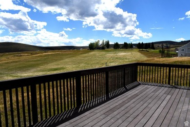 A perfect getaway, or an ideal investment property. Whatever on Bear Lake Golf Course in Utah - for sale on GolfHomes.com, golf home, golf lot