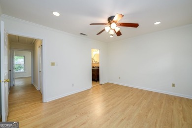 Enjoy being minutes from everything Sandy Springs has to offer on Steel Canyon Golf Club in Georgia - for sale on GolfHomes.com, golf home, golf lot