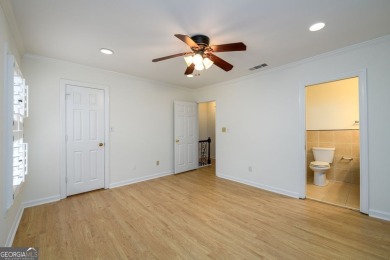 Enjoy being minutes from everything Sandy Springs has to offer on Steel Canyon Golf Club in Georgia - for sale on GolfHomes.com, golf home, golf lot