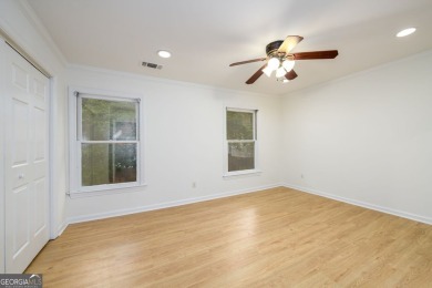 Enjoy being minutes from everything Sandy Springs has to offer on Steel Canyon Golf Club in Georgia - for sale on GolfHomes.com, golf home, golf lot