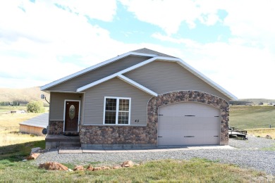 A perfect getaway, or an ideal investment property. Whatever on Bear Lake Golf Course in Utah - for sale on GolfHomes.com, golf home, golf lot