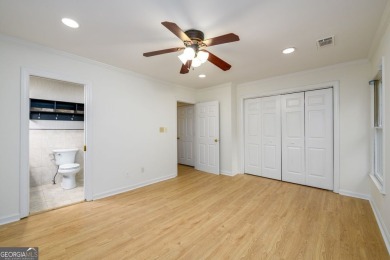 Enjoy being minutes from everything Sandy Springs has to offer on Steel Canyon Golf Club in Georgia - for sale on GolfHomes.com, golf home, golf lot