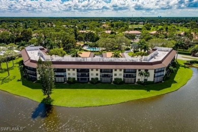 Enjoy tranquil panoramic waterfront views from the rear lanai on Royal Palm Golf Club in Florida - for sale on GolfHomes.com, golf home, golf lot