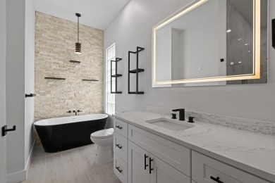 Stunning remodeled Oakmont in The Retreat with preserve views on Lost Lake Golf Club in Florida - for sale on GolfHomes.com, golf home, golf lot