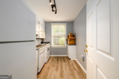 Enjoy being minutes from everything Sandy Springs has to offer on Steel Canyon Golf Club in Georgia - for sale on GolfHomes.com, golf home, golf lot