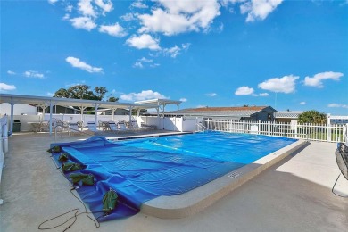 Under contract-accepting backup offers. Seller offering up to a on Lake Henry Golf Club in Florida - for sale on GolfHomes.com, golf home, golf lot