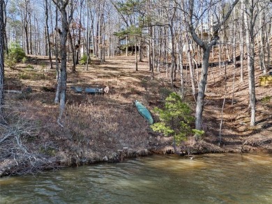 Welcome to an extraordinary lakefront sanctuary on Lake Tamarack on Bent Tree Golf Course in Georgia - for sale on GolfHomes.com, golf home, golf lot