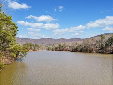 Welcome to an extraordinary lakefront sanctuary on Lake Tamarack on Bent Tree Golf Course in Georgia - for sale on GolfHomes.com, golf home, golf lot