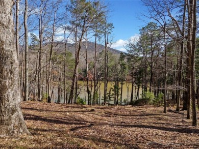 Welcome to an extraordinary lakefront sanctuary on Lake Tamarack on Bent Tree Golf Course in Georgia - for sale on GolfHomes.com, golf home, golf lot