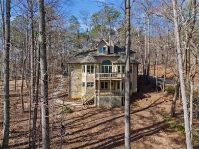 Welcome to an extraordinary lakefront sanctuary on Lake Tamarack on Bent Tree Golf Course in Georgia - for sale on GolfHomes.com, golf home, golf lot