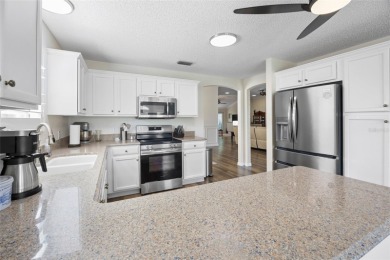 Welcome home to this enhanced Cypress (Vera Cruz) model on El Diablo Executive Golf Course in Florida - for sale on GolfHomes.com, golf home, golf lot