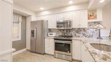 Experience modern elegance in Sawgrass #105, a meticulously on Golfview Golf and Racquet Club in Florida - for sale on GolfHomes.com, golf home, golf lot