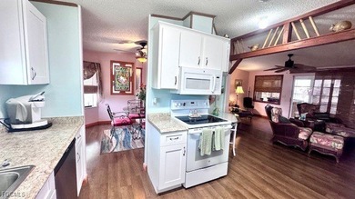 Welcome to your dream WATERFRONT home in Old Bridge Village! on Riverbend Golf and Country Club in Florida - for sale on GolfHomes.com, golf home, golf lot