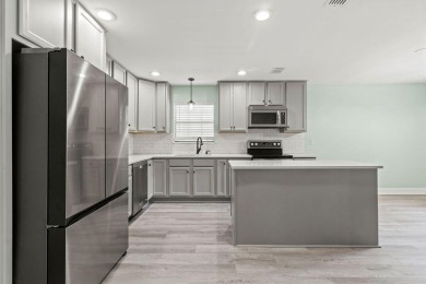 Welcome to this stunning, move-in ready home nestled in the on Golf Club at Bluewater Bay Resort in Florida - for sale on GolfHomes.com, golf home, golf lot