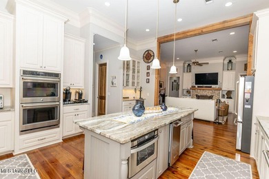 You Will Find This Seamless And Exquisite 4 Bedroom 3.5 Bath on Lake Caroline Golf Club in Mississippi - for sale on GolfHomes.com, golf home, golf lot