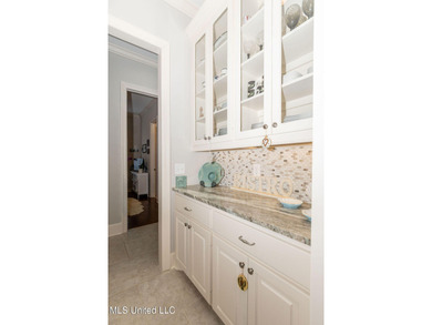 You Will Find This Seamless And Exquisite 4 Bedroom 3.5 Bath on Lake Caroline Golf Club in Mississippi - for sale on GolfHomes.com, golf home, golf lot