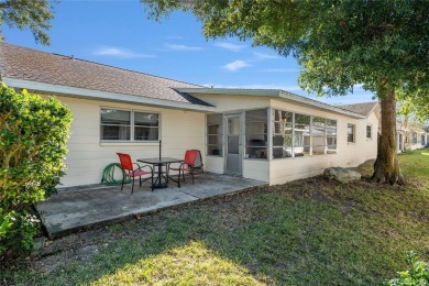 CLUB CAR GOLF CART INCLUDED IN SALE!! This end unit Expanded on On Top of the World Golf Course in Florida - for sale on GolfHomes.com, golf home, golf lot