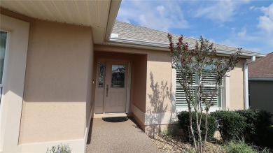 Welcome home to this beautifully maintained Jasmine II 3-bedroom on Glenview Championship Golf and Country Club in Florida - for sale on GolfHomes.com, golf home, golf lot