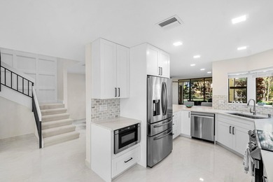 This Townhome contains the Contemporary Features & Upgrades on Boca Delray Golf and Country Club in Florida - for sale on GolfHomes.com, golf home, golf lot