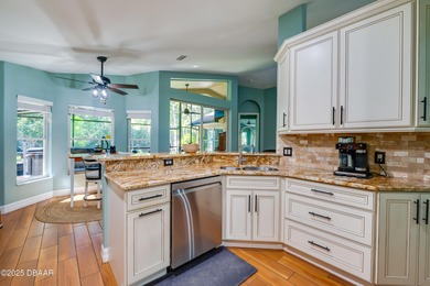 This beautifully updated 4-bedroom, 2-bathroom home in the on The Club At Pelican Bay - North Course in Florida - for sale on GolfHomes.com, golf home, golf lot