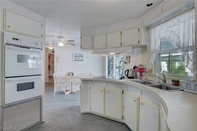 SHOCKINGLY GREAT PRICE!! COMES WITH SHARE! AND GOLF CART IS on Riverbend Golf and Country Club in Florida - for sale on GolfHomes.com, golf home, golf lot