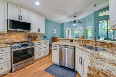 This beautifully updated 4-bedroom, 2-bathroom home in the on The Club At Pelican Bay - North Course in Florida - for sale on GolfHomes.com, golf home, golf lot