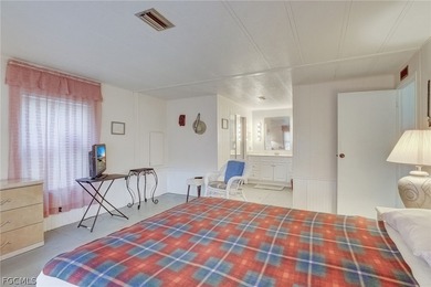 SHOCKINGLY GREAT PRICE!! COMES WITH SHARE! AND GOLF CART IS on Riverbend Golf and Country Club in Florida - for sale on GolfHomes.com, golf home, golf lot