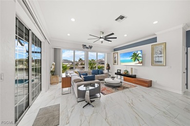 Highly desirable Gulf access home in Southwest Cape Coral, fully on Royal Tee Country Club in Florida - for sale on GolfHomes.com, golf home, golf lot