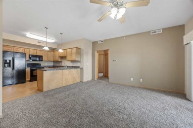 This is a wonderful 2 bed 2 bath golf course condo across from on Blue Top Ridge At Riverside in Iowa - for sale on GolfHomes.com, golf home, golf lot