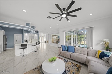 Highly desirable Gulf access home in Southwest Cape Coral, fully on Royal Tee Country Club in Florida - for sale on GolfHomes.com, golf home, golf lot