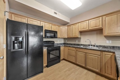 This is a wonderful 2 bed 2 bath golf course condo across from on Blue Top Ridge At Riverside in Iowa - for sale on GolfHomes.com, golf home, golf lot