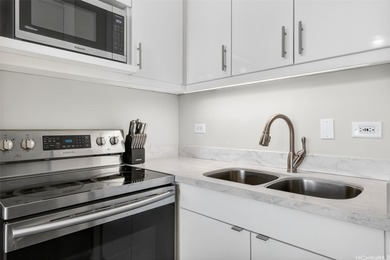 Beautifully renovated, pet-friendly penthouse unit with sweeping on Ala Wai Golf Course in Hawaii - for sale on GolfHomes.com, golf home, golf lot