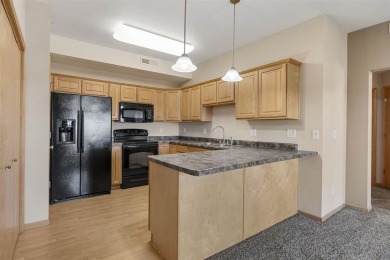 This is a wonderful 2 bed 2 bath golf course condo across from on Blue Top Ridge At Riverside in Iowa - for sale on GolfHomes.com, golf home, golf lot