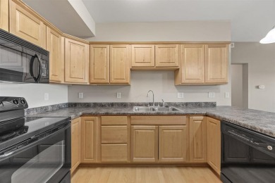 This is a wonderful 2 bed 2 bath golf course condo across from on Blue Top Ridge At Riverside in Iowa - for sale on GolfHomes.com, golf home, golf lot