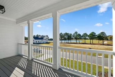 Step into relaxed coastal elegance with the Magnolia, a on Bay Creek Golf Club in Virginia - for sale on GolfHomes.com, golf home, golf lot