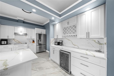 Highly desirable Gulf access home in Southwest Cape Coral, fully on Royal Tee Country Club in Florida - for sale on GolfHomes.com, golf home, golf lot