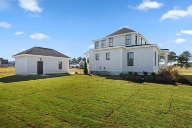 Step into relaxed coastal elegance with the Magnolia, a on Bay Creek Golf Club in Virginia - for sale on GolfHomes.com, golf home, golf lot