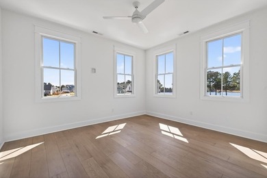 Step into relaxed coastal elegance with the Magnolia, a on Bay Creek Golf Club in Virginia - for sale on GolfHomes.com, golf home, golf lot